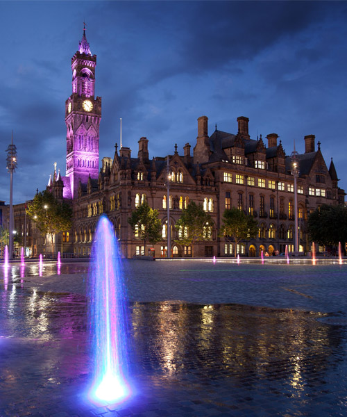 City Park, Bradford lit up pink and purple at night