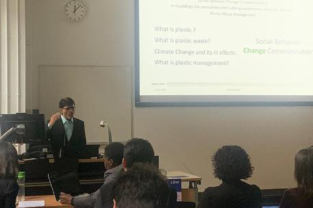 A student presenting research in sustainability conference in Leeds