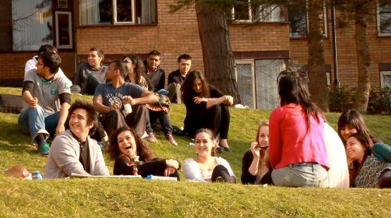 A group of students relaxing on the amp