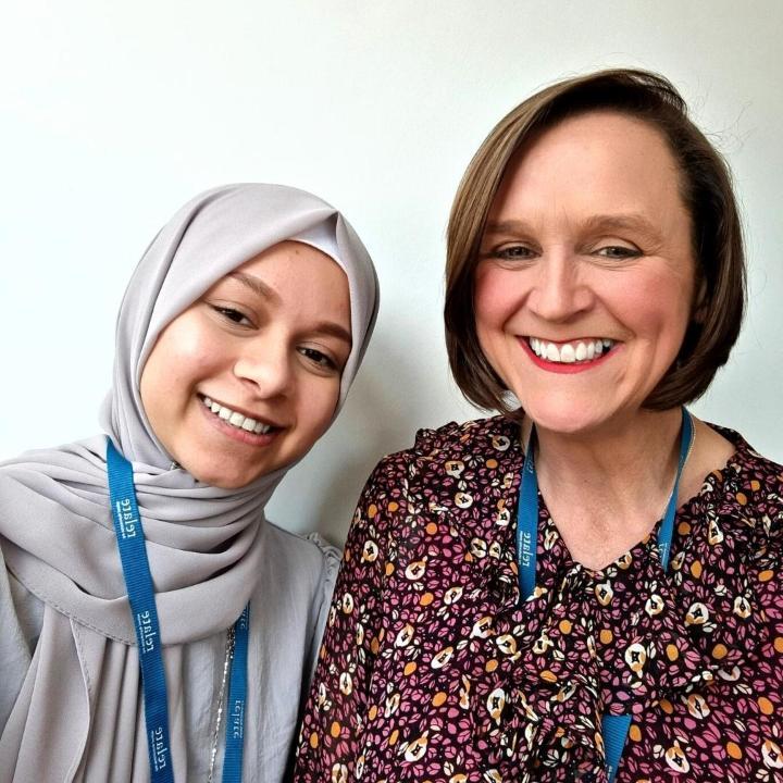 A picture of an employer and student on summer experience placement