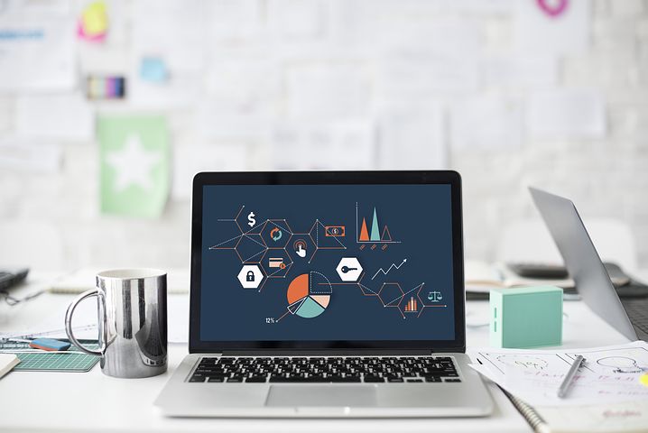 Laptop with graphics onscreen.