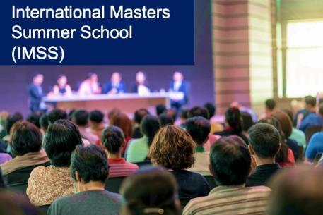 International Summer School IMSS image of conference audience and panel