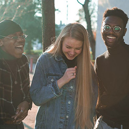 A square image of three of Faith's friends at The University of Bradford