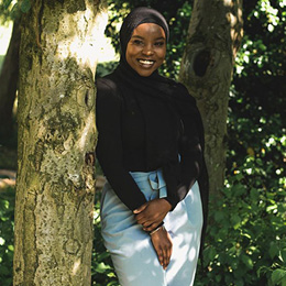 A square image taken by Faith, a Bradford student, of her friend posing outside 