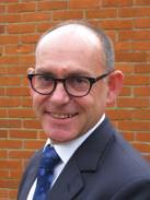 Headshot of Stuart McKinnon-Evans, Chief Finance Officer.