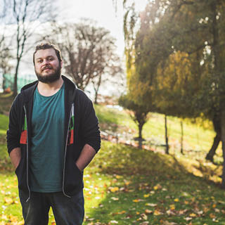 A Photograph of BA (Hons) Graphics for Games student Xander Ford.